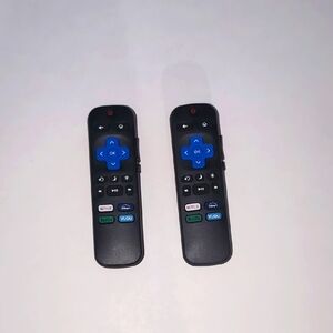 Sleek black remote control featuring vibrant blue buttons for easy navigation.